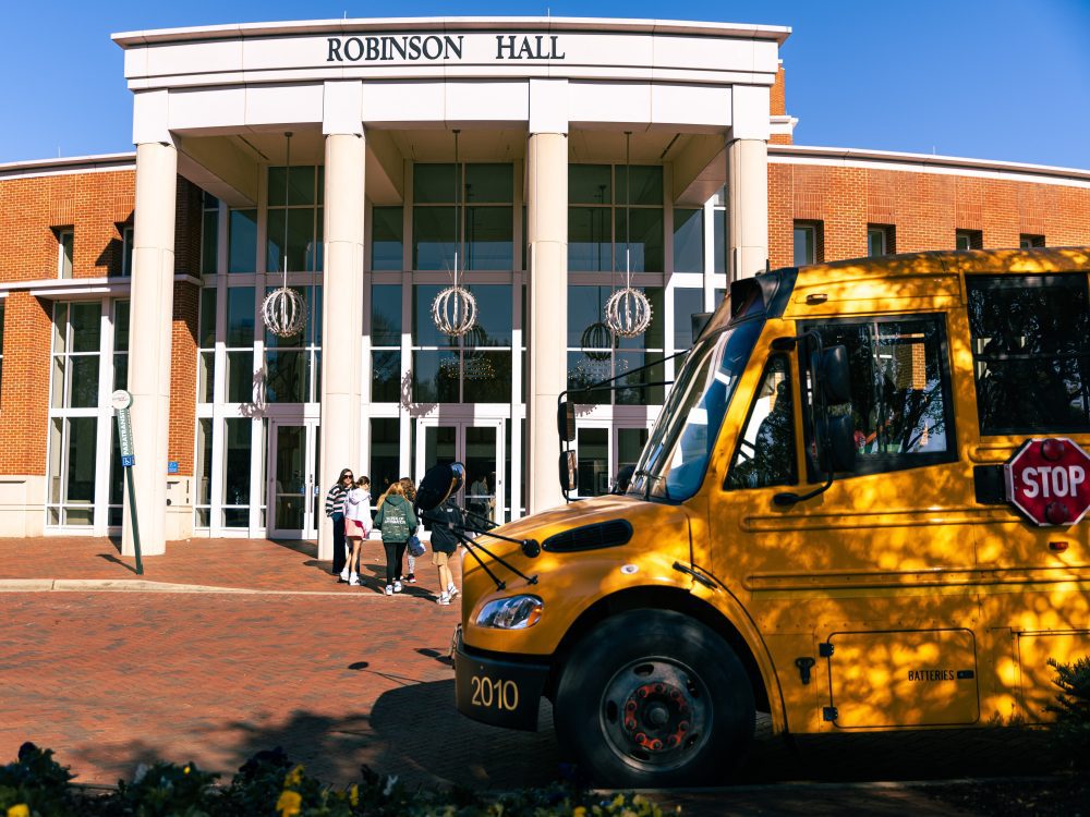 School bus in front of Robinson Hall.