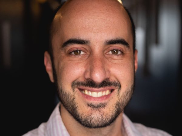 headshot of Carvalho